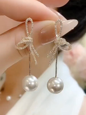 Gold Bow with Dangling Faux Pearl Earrings